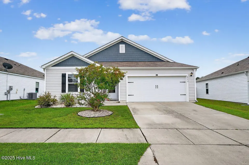 673 Chester Way NE, Leland, NC 28451 — 3-bedroom home in SeaBrooke, Leland, NC, photo 1 of 50: front photo