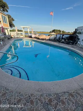 8120 Bald Eagle Lane, Wilmington, NC 28411 — 3-bedroom home in Porters Neck Plantation, Wilmington, NC, photo 4 of 7: Pool