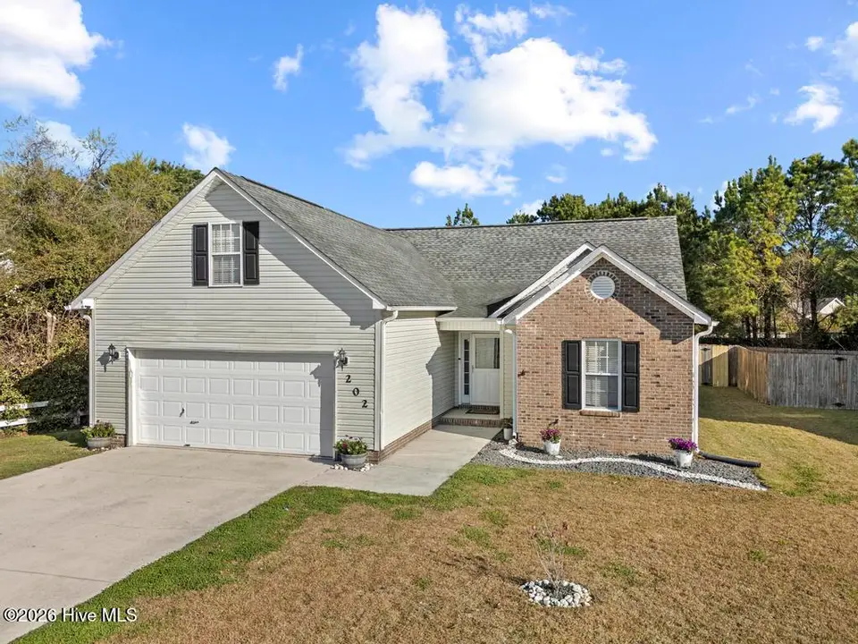 202 Brunswick Drive, Jacksonville, NC 28546 – photo 1 of 52: DJI_20260320093236_0143_D