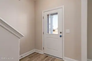 208 Shadow Grass Court, Stella, NC 28582 – photo 10: Front Door Entrance