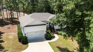 27 Pine Lake Drive, Whispering Pines, NC 28327 – photo 3: 3-web-or-mls-DJI_20250731125042_0398_D