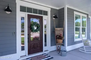 3997 Wyndmere Drive, Southport, NC 28461 – photo 8: Welcoming Covered Front Porch