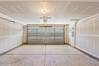 8035 Sterling Oak Drive NW, Ash, NC 28420 – photo 18: 2 Car Garage