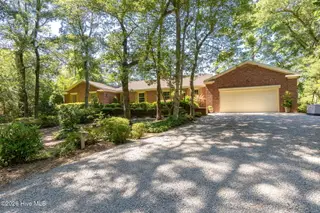 105 Magnolia Court, Pine Knoll Shores, NC 28512 – photo 2: 4-web-or-mls-chadwick-visuals-105-magnol
