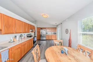 126 Forest Bluff Drive, Jacksonville, NC 28540 — 3-bedroom home in River Hills, Jacksonville, NC, photo 9 of 22: Kitchen & Dining