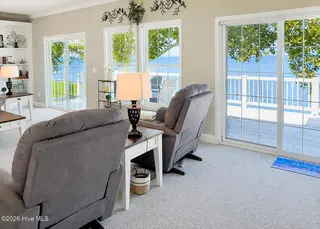 144 Great Neck Road, Havelock, NC 28532 – photo 6: Living Room with three view of the River