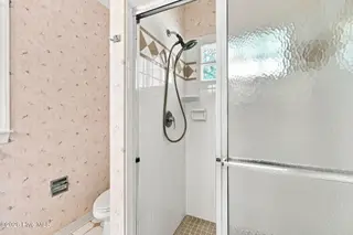 110 Sutton Drive, Cape Carteret, NC 28584 – photo 19: Primary bathroom step in shower