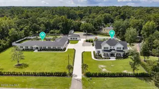 1420 Eastwood Road, Wilmington, NC 28403 — 8-bedroom home in Cavalier Woods, Wilmington, NC, photo 1 of 71: 001_dji_20260911122315_0305_d_868