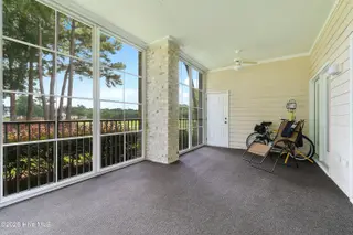 172 Clubhouse Road Apt 1, Sunset Beach, NC 28468 – photo 23: Three season room