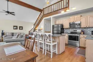 6707 Kings Lynn Drive, Oak Island, NC 28465 – photo 12: 6707 stairs