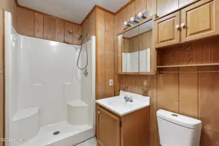 1021 Filmore Street, Southport, NC 28461 — 3-bedroom home in Boiling Spring Lakes, Southport, NC, photo 19 of 77: Primary en suite bath