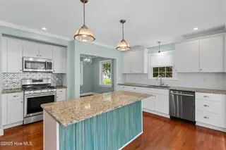 102 N 25th Street, Wilmington, NC 28405 — 2-bedroom home, Wilmington, NC, photo 6 of 35: Open Kitchen - Sunroom