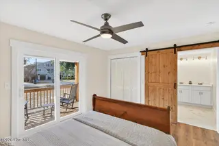 501 Shoreline Drive E, Sunset Beach, NC 28468 – photo 16: Primary Bedroom Suite