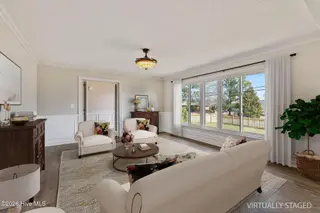 303 N Lincoln Street, Benson, NC 27504 – photo 17: Formal Living Room - Virtually Staged