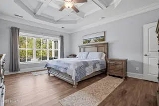 6476 Bryson Drive SW, Ocean Isle Beach, NC 28469 – photo 18: 1st level primary suite