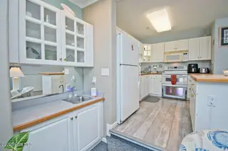 2804 Pier Pointe Drive 7a1, Emerald Isle, NC 28594 – photo 11: Wet bar and Kitchen