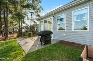 580 Slippery Rock Way, Calabash, NC 28467 — 3-bedroom home in The Farm, Calabash, NC, photo 17 of 46: Back Patio