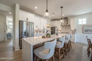 Lot 39 Dona Drive, Carthage, NC 28327 – photo 13: 9 HHHunt Homes - Chatham- Kitchen island