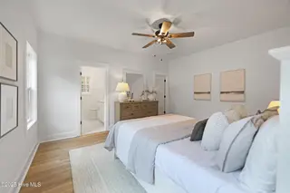 82 Northeast Drive NW, Calabash, NC 28467 – photo 13: 82NE Master bedroom view with 1st closet