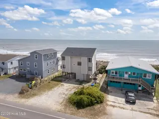 3909 W Beach Drive, Oak Island, NC 28465 – photo 7: 5-web-or-mls-DJI_20260408135904_0408_D