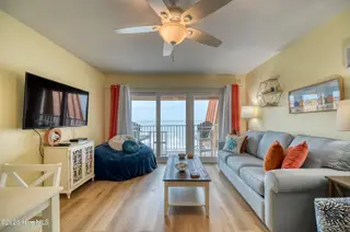1822 New River Inlet Road Unit 1304a, North Topsail Beach, NC 28460 – photo 3: Living Room 1