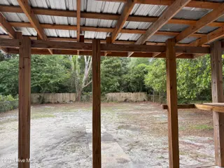 226 Calhoun Drive, Wilmington, NC 28412 — 2-bedroom home in Belmont, Wilmington, NC, photo 11 of 12: Covered Rear Porch
