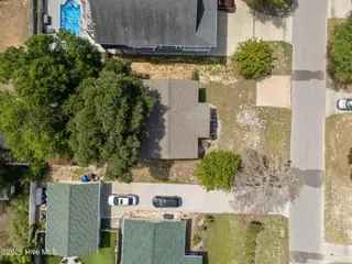 132 NE 3rd Street, Oak Island, NC 28465 – photo 8: 8-web-or-mls-DJI_20250730114233_0823_D