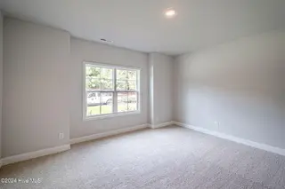 1025 Wood Creek Road NE, Leland, NC 28451 – photo 23: *REPRESENTATIVE PHOTO* Bedroom 2