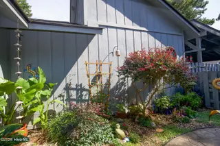 171 Cranes Cove, Vass, NC 28394 – photo 4: 03_Courtyard-Corner-Landscaping_171-Cran