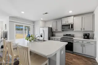 141 Fresh Air Drive, Hampstead, NC 28443 – photo 9: 13-web-or-mls-GI - 141 Fresh Air Dr - Li