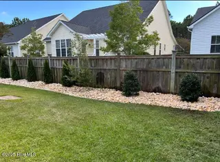 3918 Meeting Place Lane, Southport, NC 28461 — 4-bedroom home in Arbor Creek, Southport, NC, photo 5 of 57: trees