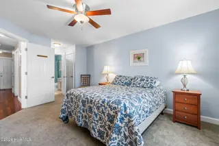 908 Resort Circle Unit 512, Sunset Beach, NC 28468 — 2-bedroom condo in Colony II, Sunset Beach, NC, photo 17 of 39: Primary Bedroom