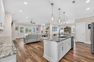 460 Summerhouse Drive, Holly Ridge, NC 28445 – photo 3: open kitchen and living area