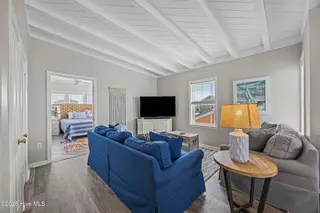 5127 W Beach Drive, Oak Island, NC 28465 – photo 24: 45_living room