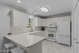1603 W Oak Island Drive, Oak Island, NC 28465 – photo 10: 1603 W. Oak Island Drive