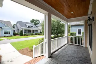 402 Cornubia Drive, Castle Hayne, NC 28429 – photo 3: Cornubia402-2fprchShaneL33A4559 copy - C