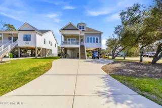 202 NE 64th Street, Oak Island, NC 28465 – photo 3: Welcome to 202 NE 64th St