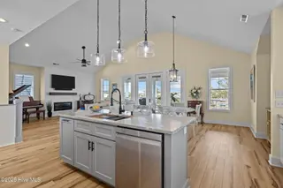 1402 Olde Farm Road, Morehead City, NC 28557 – photo 7: Kitchen and Living Room