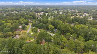 201 Evanswood Drive, Greenville, NC 27858 – photo 7: 12-web-or-mls-DJI_20260923142355_0467_D
