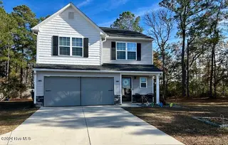 49 Patrick Henry Circle NW, Supply, NC 28462 — 3-bedroom home in Richmond Hills, Supply, NC, photo 2 of 36: Front Exterior