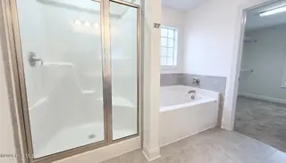 2007 Snapper Street, New Bern, NC 28562 — 4-bedroom home in Bluewater Rise, New Bern, NC, photo 20 of 31: 18 Soaking Tub and Walk-in Shower