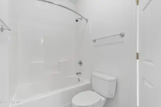 172 Clubhouse Road Apt 1, Sunset Beach, NC 28468 – photo 20: Guest bathroom