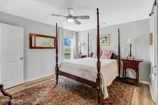 4901 Abbington Oaks Way SE, Southport, NC 28461 — 3-bedroom home in Groves at Southport, Southport, NC, photo 14 of 31: Primary Suite