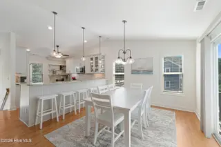 106 Wyndward Court, Emerald Isle, NC 28594 – photo 14: Dining area with deck access