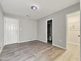 508 Redwood Place 2, Jacksonville, NC 28540 — 3-bedroom condo in Shamrock Village, Jacksonville, NC, photo 24 of 35: First Floor bedroom