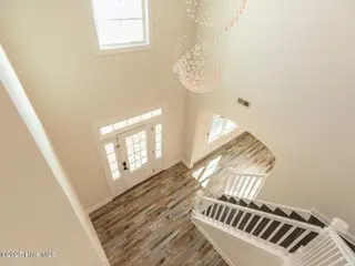 211 Cheswick Drive, Holly Ridge, NC 28445 – photo 10: Foyer chandelier