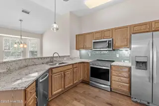 7589 Dunbar Drive SW, Sunset Beach, NC 28468 – photo 16: 23-web-or-mls-7589 Dunbar Dr SW 21