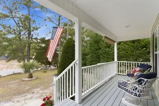 168 NE 3rd Street, Oak Island, NC 28465 – photo 7: 53-web-or-mls-dsc09825