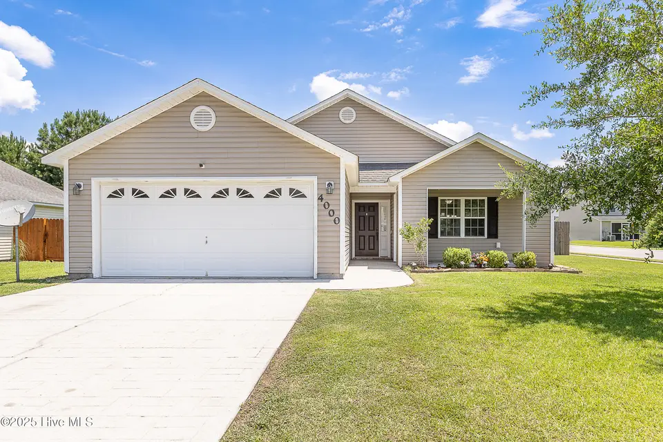 4000 W T Whitehead Drive, Jacksonville, NC 28546 – photo 1 of 24: Front of Home
