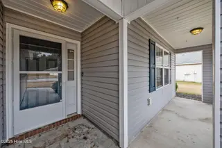 4015 W T Whitehead Drive, Jacksonville, NC 28546 – photo 5: Porch Front Door